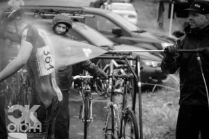 Brian Dallas of WD-40 Bike give a junior racer a quick wash, ensuring a somewhat cleaner drive home.